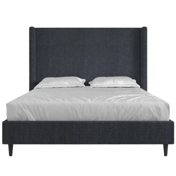 Dark blue canvas queen-size platform bed with tall wingback headboard and black tapered legs.

