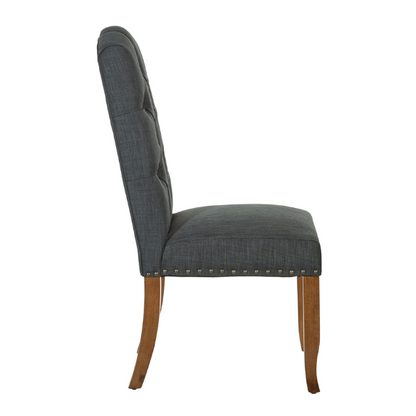 Set of 2 dark grey button-tufted farmhouse dining chairs with rustic wood legs, nailhead trim, and upholstered linen-like fabric.

