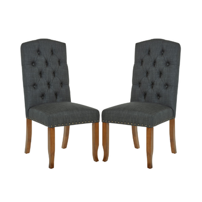 Set of 2 dark grey button-tufted farmhouse dining chairs with rustic wood legs, nailhead trim, and upholstered linen-like fabric.

