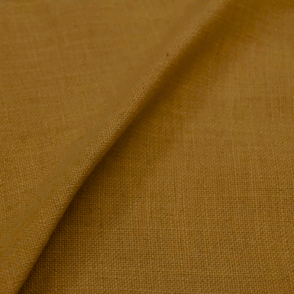 Dry copper king-size upholstered bed in velvet fabric with wingback headboard and low-profile black metal legs.

