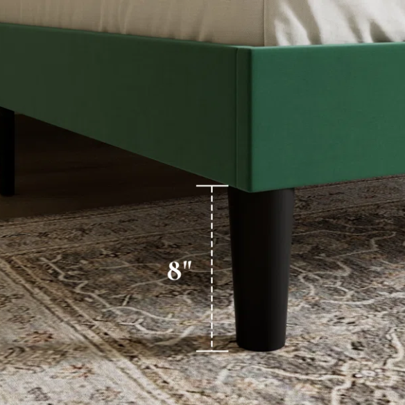Emerald green velvet queen bed with tufted wingback headboard, 8-inch underbed clearance, and solid wood frame.


