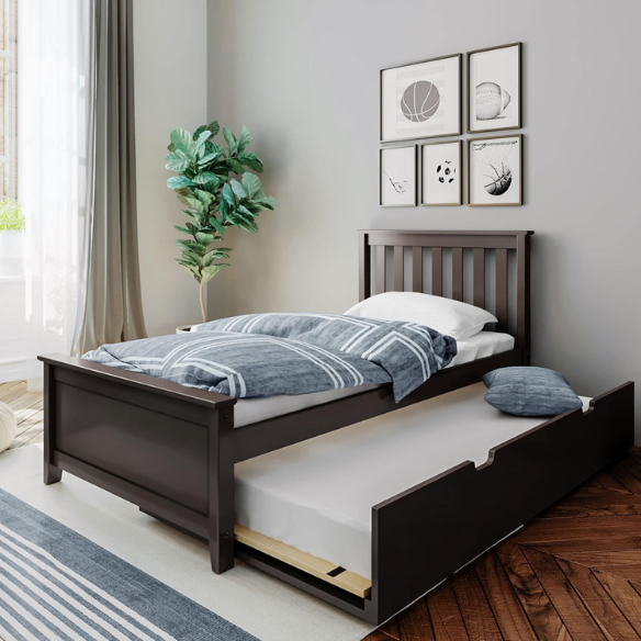 Espresso-finished solid wood twin bed with pull-out trundle, modern slatted headboard and footboard, perfect for kids’ rooms and sleepovers.