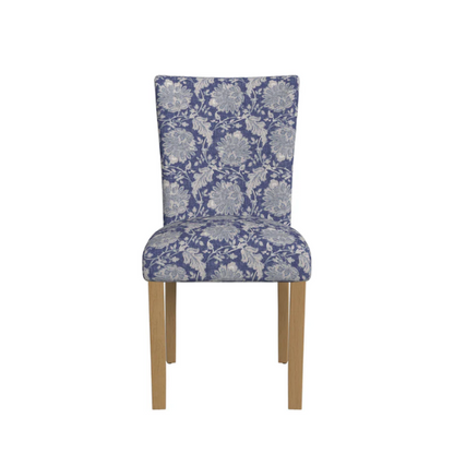 Set of two blue and cream floral Parsons dining chairs with high back, scalloped seat front, and wood legs in a traditional design