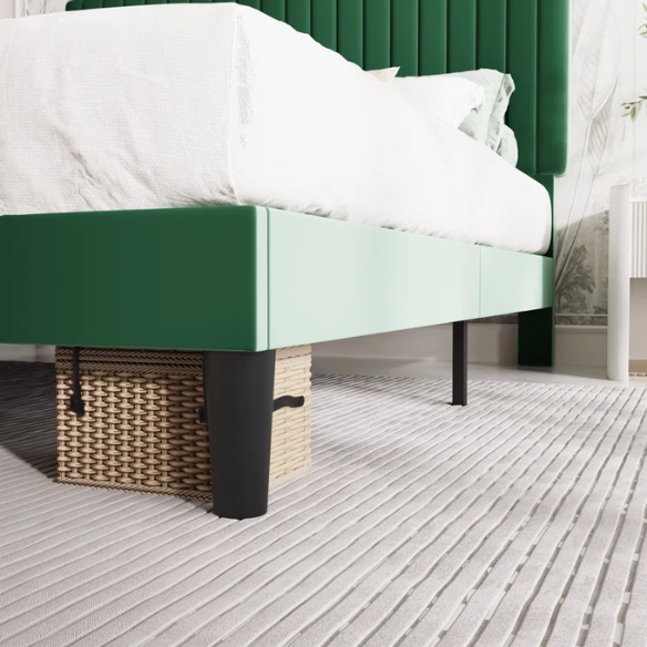 Forest green velvet upholstered queen bed with tufted rectangular headboard and low-profile frame.

