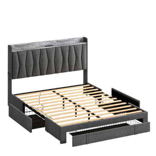 Full size dark grey upholstered platform bed with padded linen headboard, built-in storage shelf and charging station, and three underbed rolling drawers for extra storage.

