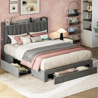 Full size dark grey upholstered platform bed with padded linen headboard, built-in storage shelf and charging station, and three underbed rolling drawers for extra storage.

