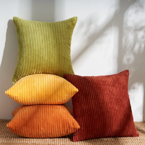 Set of 4 striped corduroy pillow covers in green, red, orange, and yellow – 18x18 decorative cushion covers with gradient pattern and hidden zippers for boho or festive home decor.