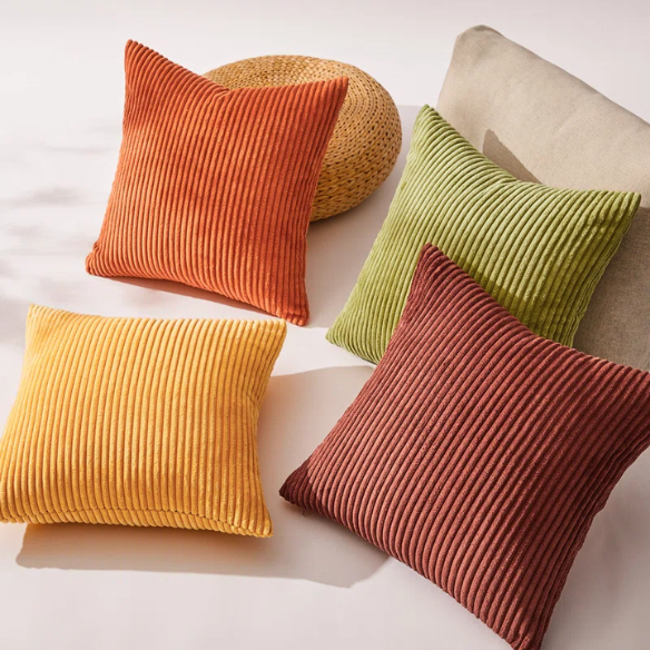Set of 4 striped corduroy pillow covers in green, red, orange, and yellow – 18x18 decorative cushion covers with gradient pattern and hidden zippers for boho or festive home decor.