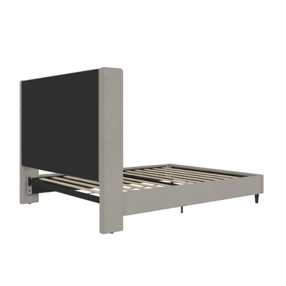 Grey canvas queen platform bed with extra-tall wingback tufted headboard and black tapered legs.

