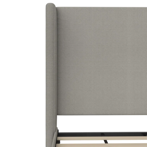 Grey canvas queen platform bed with extra-tall wingback tufted headboard and black tapered legs.


