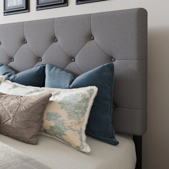 Grey polyester upholstered queen bed with diamond-tufted adjustable headboard and four underbed storage drawers.

