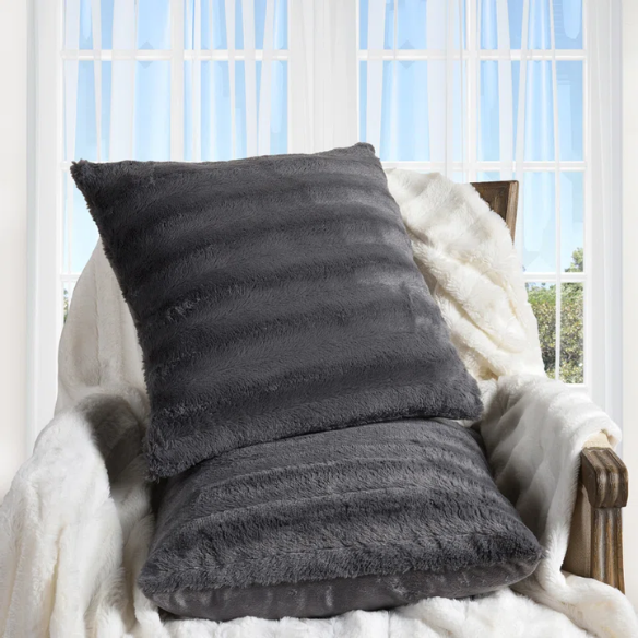 Set of two grey faux fur throw pillows, 18x18 inches, square plush decorative cushions with soft microfiber filling—perfect for modern sofas, beds, and neutral-toned interiors

