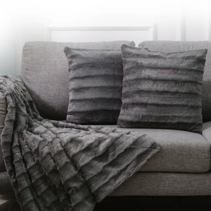Set of two grey faux fur throw pillows, 18x18 inches, square plush decorative cushions with soft microfiber filling—perfect for modern sofas, beds, and neutral-toned interiors

