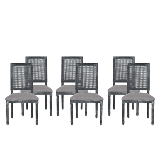Set of 6 grey French country dining chairs with cane backs, upholstered seats, and weathered wood finish, perfect for rustic farmhouse interiors.

