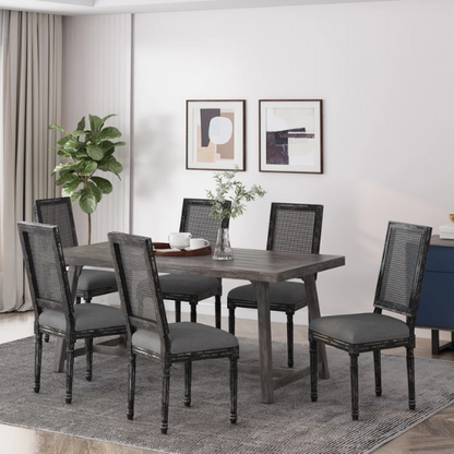 Set of 6 grey French country dining chairs with cane backs, upholstered seats, and weathered wood finish, perfect for rustic farmhouse interiors.

