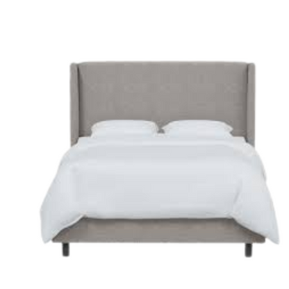 Grey king-size upholstered bed in linen fabric with wingback headboard and black metal legs.

