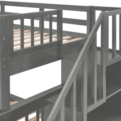 Twin over full bunk bed in grey finish with stairs, built-in storage compartments, and three underbed drawers – solid wood frame for kids and teens


