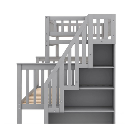 Modern grey twin over full bunk bed with built-in stairs and storage drawers, solid wood frame with safety rails, perfect for kids’ bedrooms.