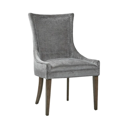 Set of 2 upholstered armless dining chairs in soft grey chenille with high backs, piped detailing, and solid wood legs.

