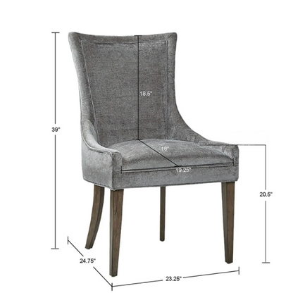 Set of 2 upholstered armless dining chairs in soft grey chenille with high backs, piped detailing, and solid wood legs.

