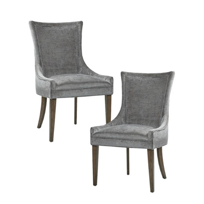 Set of 2 upholstered armless dining chairs in soft grey chenille with high backs, piped detailing, and solid wood legs.

