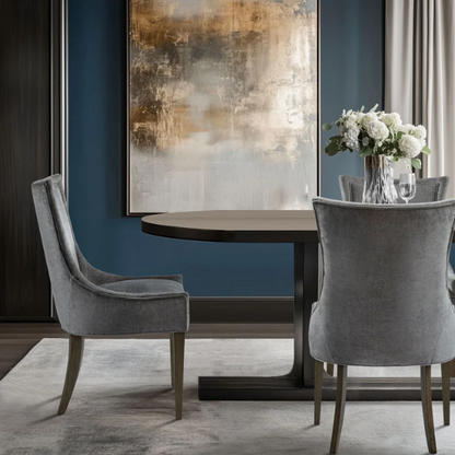 Set of 2 upholstered armless dining chairs in soft grey chenille with high backs, piped detailing, and solid wood legs.

