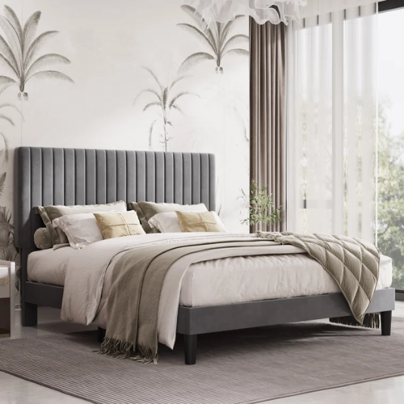 Grey velvet upholstered queen bed with tufted rectangular headboard and low-profile frame.

