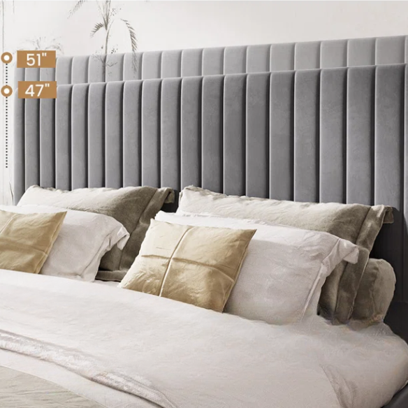 Grey velvet upholstered queen bed with tufted rectangular headboard and low-profile frame.

