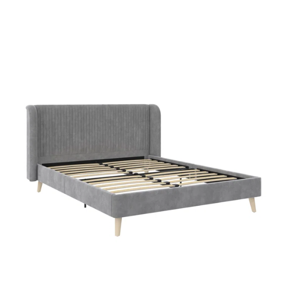 Grey velvet upholstered queen-size platform bed with wingback tufted headboard and mid-century wooden legs.

