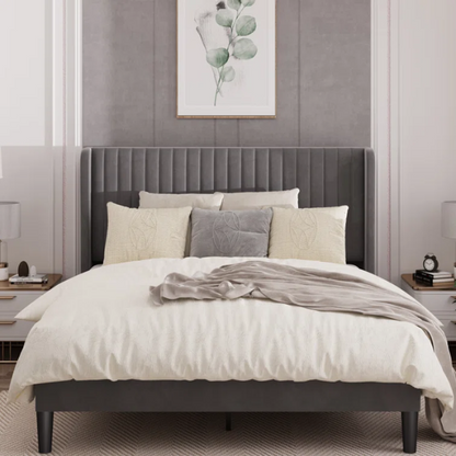 Grey velvet upholstered queen bed with tufted wingback headboard, 8-inch underbed clearance, and sturdy wood frame.


