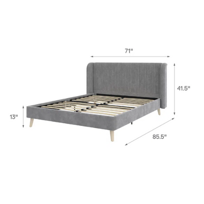Grey velvet upholstered queen-size platform bed with wingback tufted headboard and mid-century wooden legs.

