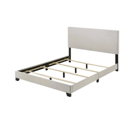 Light beige upholstered full size bed frame with rectangular padded headboard, low-profile footboard, and solid wood construction in a modern minimalist design.

