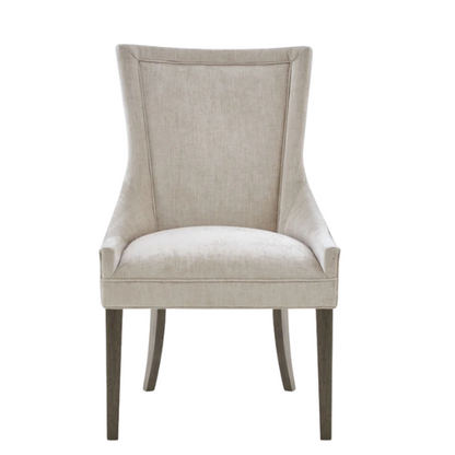 Set of 2 upholstered armless dining chairs in light beige with solid wood legs, high backrest, and elegant piping detail.


