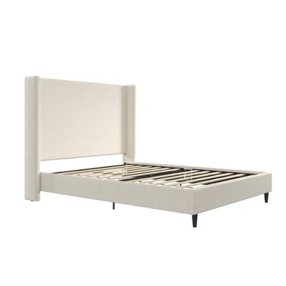 Light cream boucle queen-size platform bed with tall wingback tufted headboard and black tapered legs.

