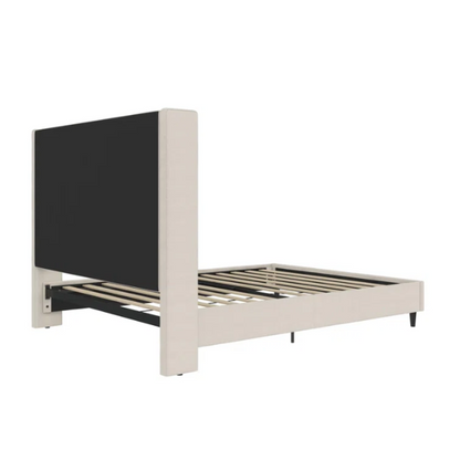 Light cream canvas upholstered queen-size bed with extra-tall wingback tufted headboard and black tapered legs.

