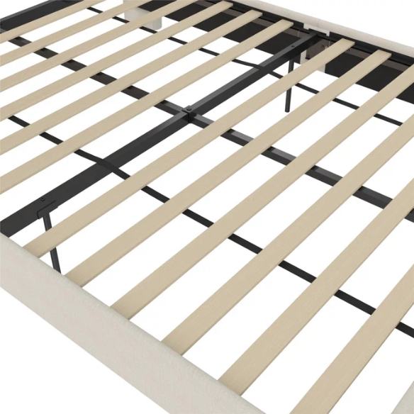 Light cream canvas upholstered queen-size bed with extra-tall wingback tufted headboard and black tapered legs.

