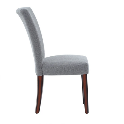 Set of 2 upholstered Parson dining chairs in light grey fabric with espresso-finished wood legs and padded high backs, ideal for dining or accent seating.

