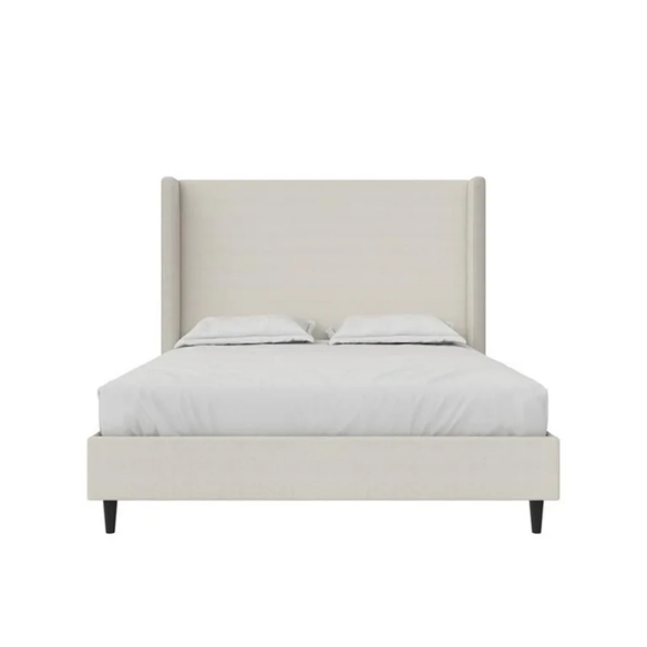 Light grey king-size upholstered bed with performance velvet fabric, wingback headboard, and low-profile black metal legs.

