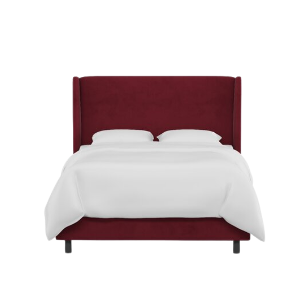 Maroon king-size upholstered bed in velvet with wingback headboard and low-profile black metal legs.

