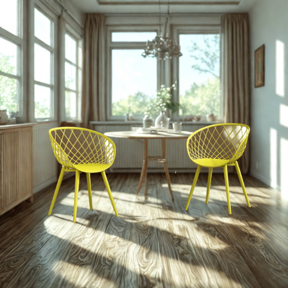 Set of two yellow mid-century modern chairs with matte molded seats and angled steel legs.

