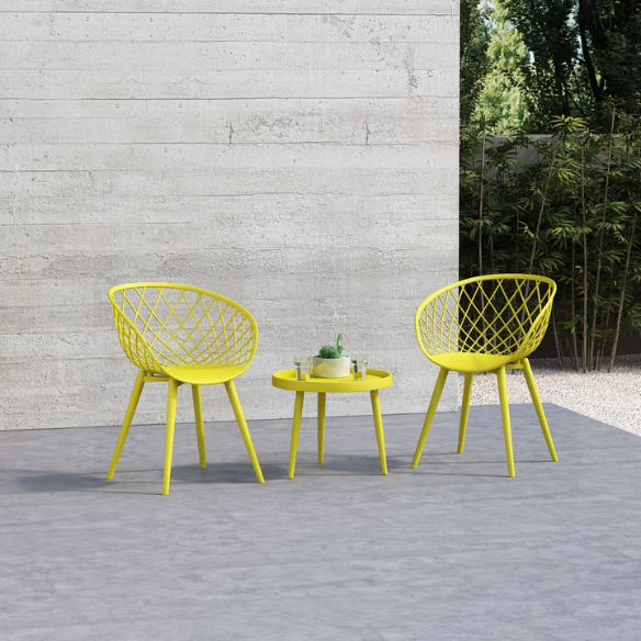 Set of two yellow mid-century modern chairs with matte molded seats and angled steel legs.

