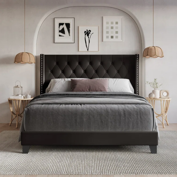Mocha brown full size upholstered bed with tufted wingback headboard, nailhead trim, and faux leather finish on a solid wood frame.

