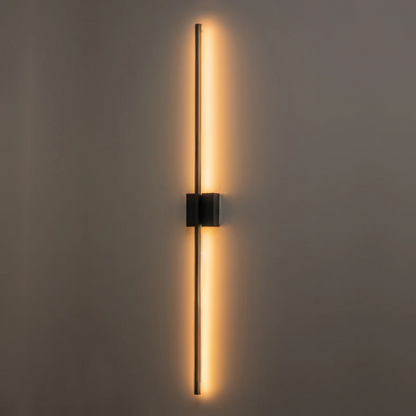 Modern black linear LED wall sconce with matte finish, designed for vertical or horizontal installation in contemporary interiors