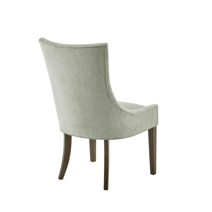 Set of 2 upholstered armless dining chairs in muted green with solid wood legs, high backrest, and elegant piping detail.

