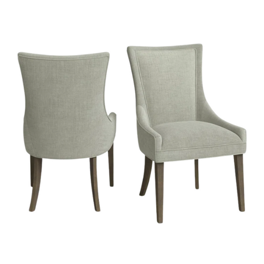 Set of 2 upholstered armless dining chairs in muted green with solid wood legs, high backrest, and elegant piping detail.

