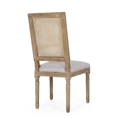 Set of 6 French country dining chairs with natural wood frames, handwoven cane backs, and light grey upholstered seats, featuring fluted legs and classic rustic charm.

