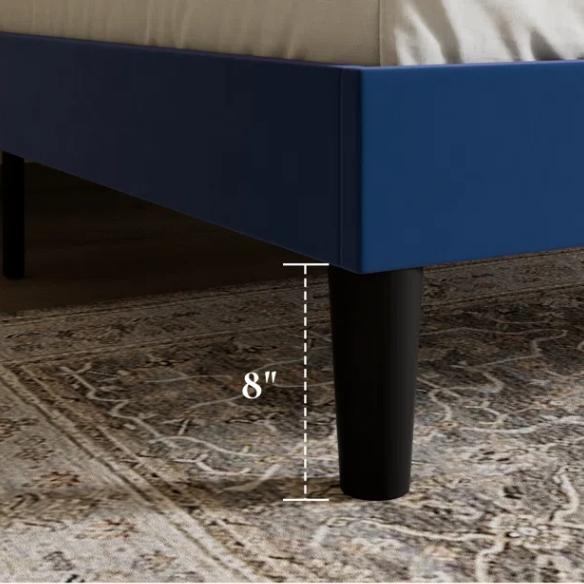 Navy blue velvet queen bed with tufted wingback headboard, 8-inch underbed clearance, and a solid wood frame.

