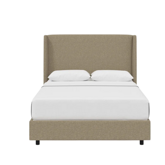 Neutral tan king-size upholstered bed in linen fabric with wingback headboard and black metal legs.


