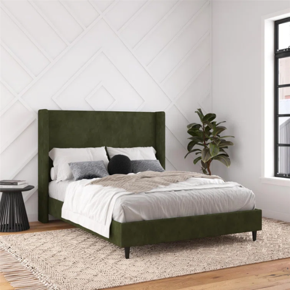 Olive drab soft woven queen-size platform bed with tall wingback tufted headboard and black tapered legs.

