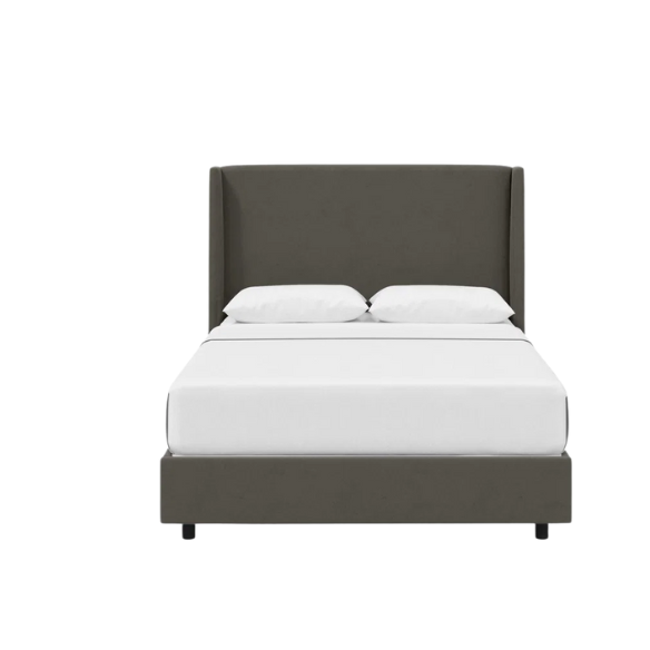 Pewter king-size upholstered bed in velvet fabric with wingback headboard and low-profile black metal legs.

